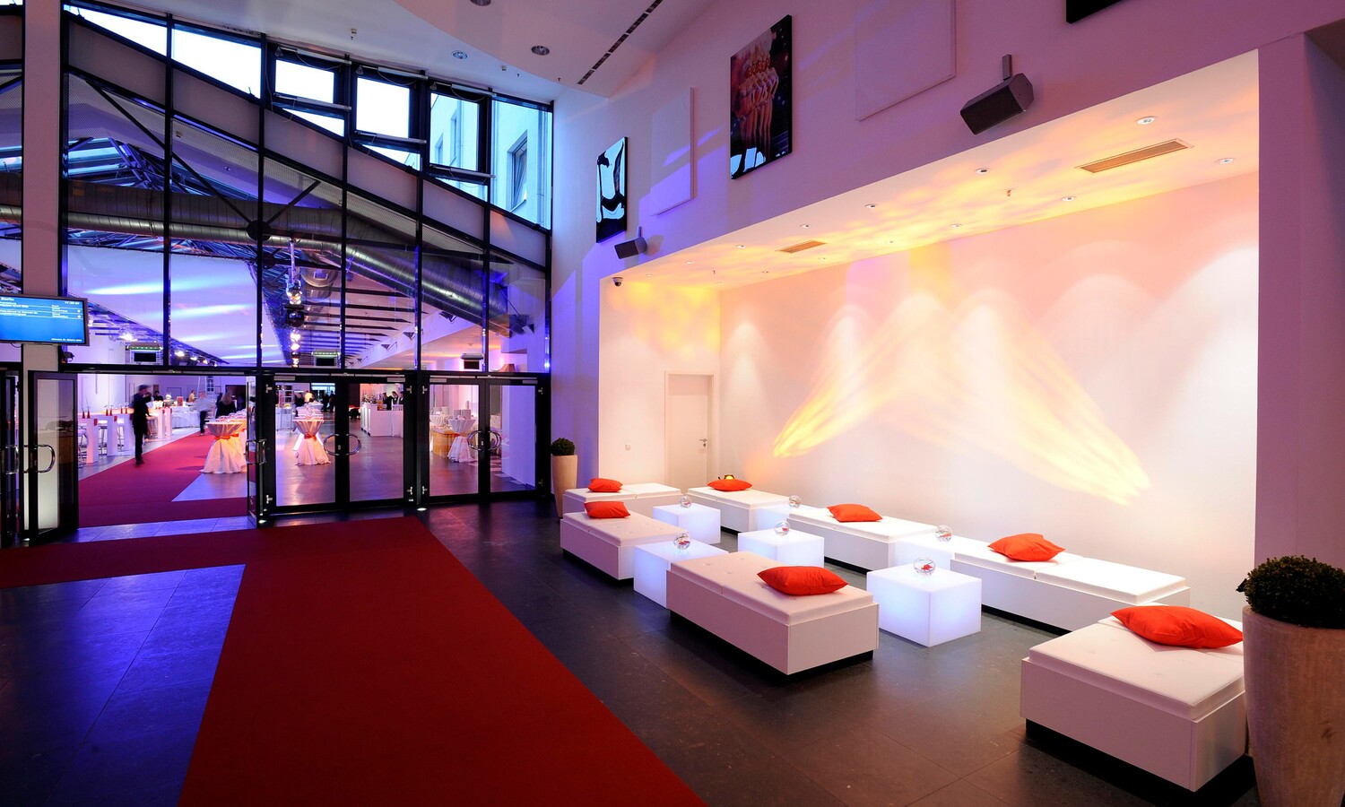 Lounge area next to the red carpet for an evening event