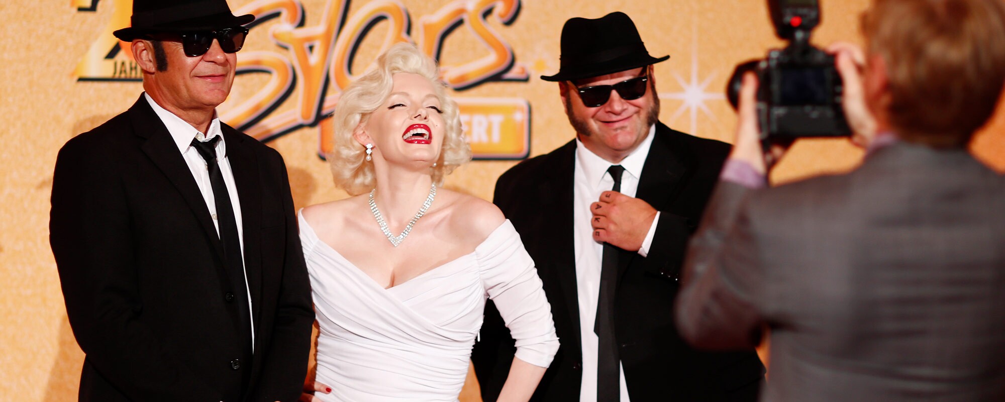 Impersonators of Marilyn Monroe and Blues Brothers on the red carpet